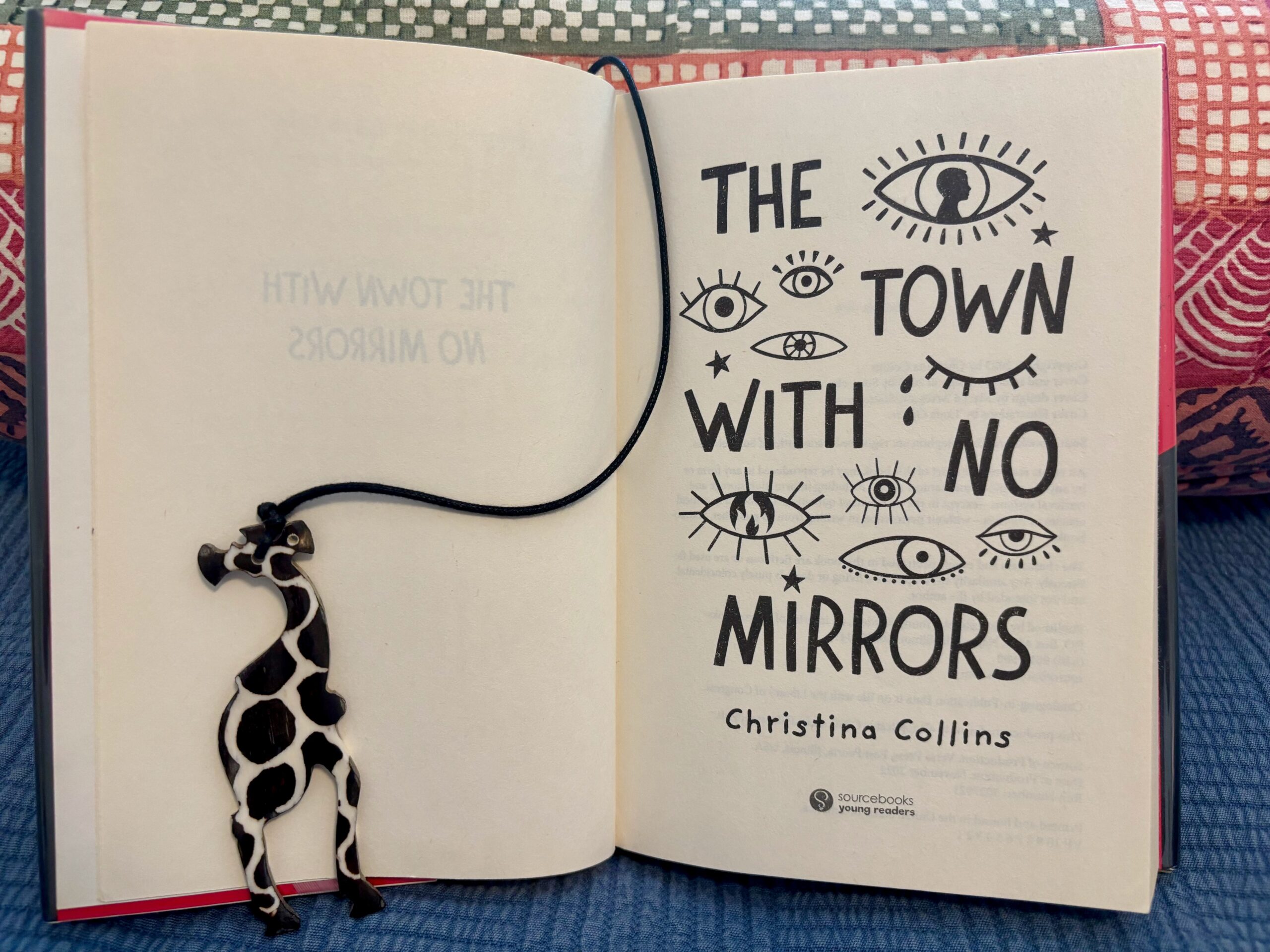 “The Town With No Mirrors” by Christina Collins