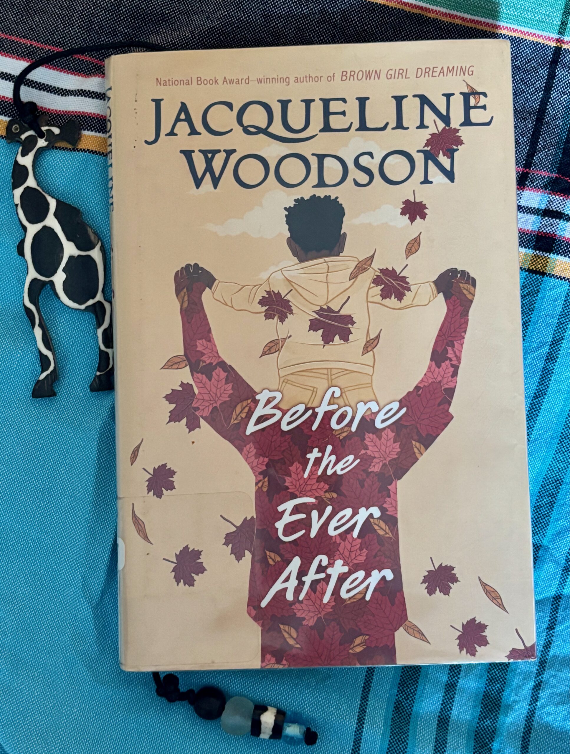 Photo of the cover of the book "Before the Ever After" by Jacqueline Woodson. 